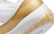 WOMEN'S AIR JORDAN 11 LOW WHITE / METALLIC GOLD "MOTHER'S DAY"
