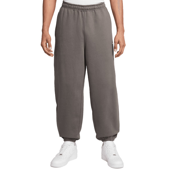 SOLO SWOOSH CUFFED FLEECE PANTS
