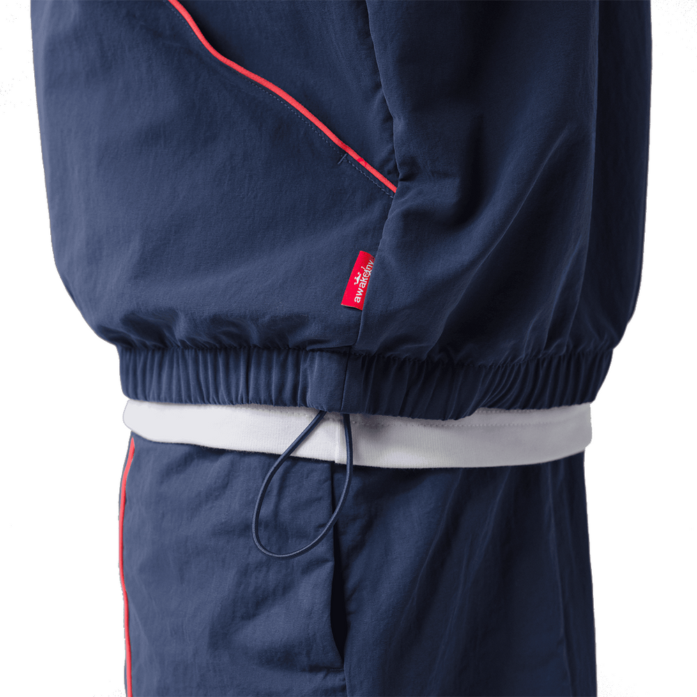 JORDAN X AWAKE NY TRACK JACKET MIDNIGHT NAVY / INFRARED 23