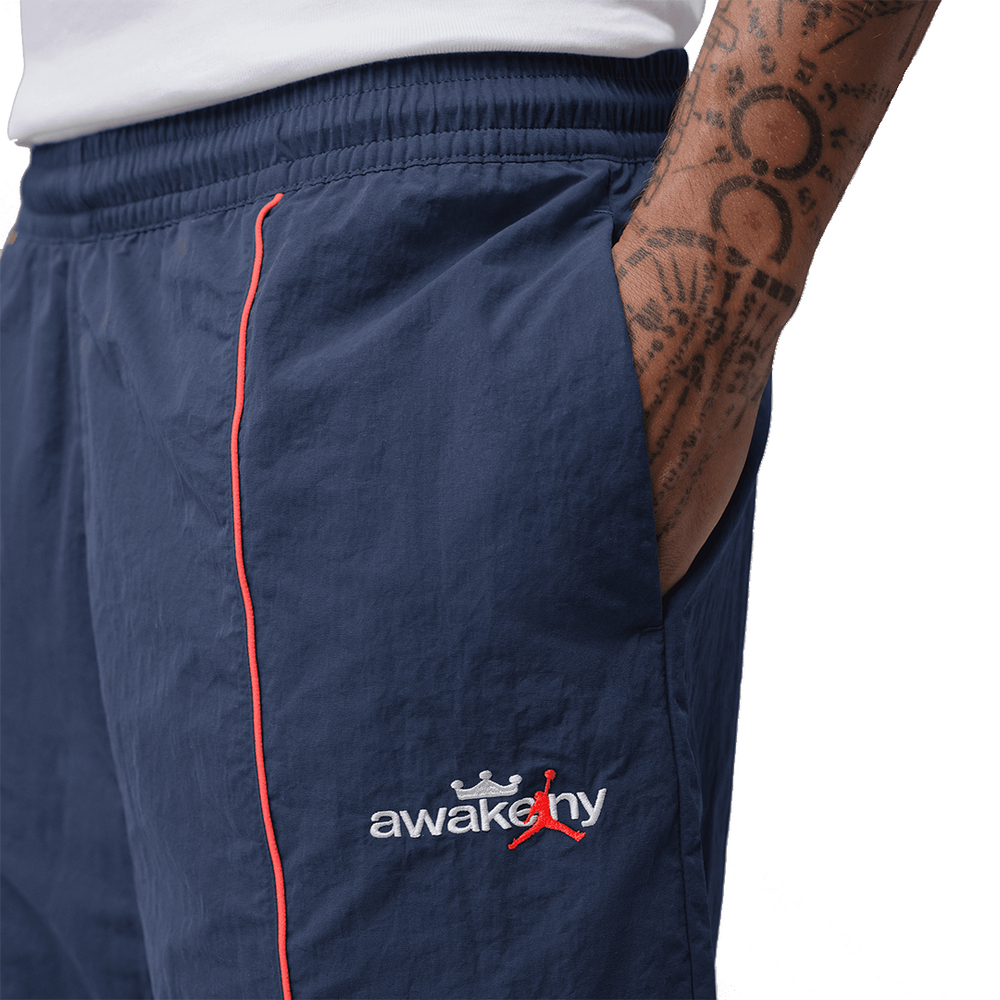 JORDAN X AWAKE NY TRACK PANTS MIDNIGHT NAVY / INFRARED 23
