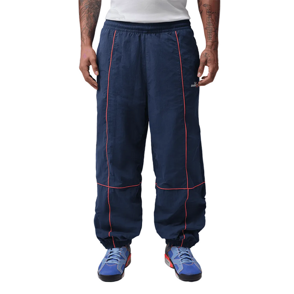 JORDAN X AWAKE NY TRACK PANTS MIDNIGHT NAVY / INFRARED 23