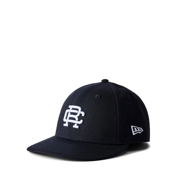 REIGNING CHAMP X NEW ERA LOW PRO 59FIFTY MONOGRAM CAP